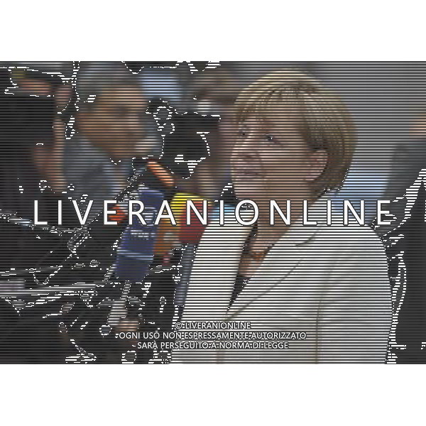 (140527) -- BRUSSELS, May 27, 2014 () -- German Chancellor Angela Merkel arrives to take part in an informal EU leaders summit at the EU headquarters in Brussels, capital of Belgium, May 27, 2014. The nomination of new EU leaders after and the latest development in Ukraine following the Presidential election are the two majors topics in the meeting. (/Ye Pingfan) ©photoshot/AGENZIA ALDO LIVERANI SAS - ITALY ONLY - Vertice informale dei leader dell\'Unione Europea presso la sede a Bruxelles in Belgio, 27 maggio 2014 per discutere della nomina di nuovi leader europei dopo le elezioni e degli ultimi sviluppi in Ucraina