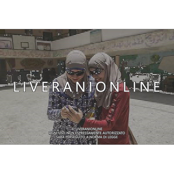 (140528) -- CAIRO, May 28, 2014 () -- Two women prepare to vote in the presidential election at a polling station in Cairo, Egypt, May 27, 2014. (/Cui Xinyu) (yc) ©PHOTOSHOT/AGENZIA ALDO LIVERANI SAS - ITALY ONLY - EDITORIAL USE ONLY
