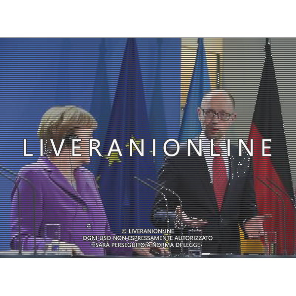 (140528) -- BERLIN, May 28, 2014 () -- German Chancellor Angela Merkel (L) and Ukrainian Prime Minister Arseniy Yatsenyuk attend a press conference prior to a dinner and joint talks at the Chancellery in Berlin, Germany, on May 28, 2014. Ukrainian Prime Minister Arseny Yatsenyuk said on Wednesday that his country should become a European country under the newly elected President Petro Poroshenko. (/Zhang Fan) AG ALDO LIVERANI SAS ONLY ITALY
