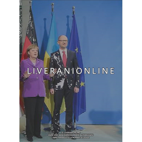(140528) -- BERLIN, May 28, 2014 () -- German Chancellor Angela Merkel (L) and Ukrainian Prime Minister Arseniy Yatsenyuk pose for photos during a press conference prior to a dinner and joint talks at the Chancellery in Berlin, Germany, on May 28, 2014. Ukrainian Prime Minister Arseny Yatsenyuk said on Wednesday that his country should become a European country under the newly elected President Petro Poroshenko. (/Zhang Fan) AG ALDO LIVERANI SAS ONLY ITALY