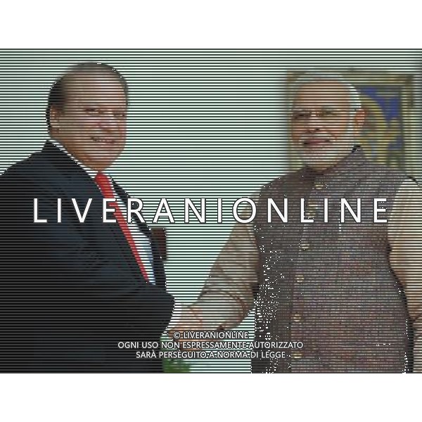 (140527) -- NEW DELHI, May 27, 2014 () -- Indian Prime Minister Narendra Modi (R) shakes hands with his Pakistani counterpart Nawaz Sharif before their meeting at Hyderabad House in New Delhi, India, May 27, 2014. (/Partha Sarkar) ©PHOTOSHOT/AGENZIA ALDO LIVERANI SAS - ITALY ONLY - EDITORIAL USE ONLY