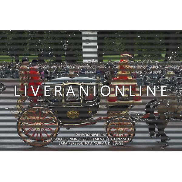 A carriage carrying The Queen\'s crown and spire leaves Buckingham Palace prior to the departure of the Queen on June 4, 2014 in London, England. Queen Elizabeth II is to unveil government\'s legislative programme in a speech delivered to Members of Parliament and Peers in The House of Lords during the annual state opening of the British parliament. AG ALDO LIVERANI SAS ONLY ITALY