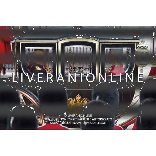 A carriage carrying The Queen\'s crown and spire leaves Buckingham Palace prior to the departure of the Queen on June 4, 2014 in London, England. Queen Elizabeth II is to unveil government\'s legislative programme in a speech delivered to Members of Parliament and Peers in The House of Lords during the annual state opening of the British parliament. AG ALDO LIVERANI SAS ONLY ITALY