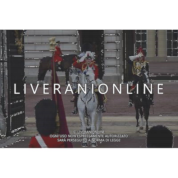 A Guard of Honour lines up in formation outside Buckingham Palace on June 4, 2014 in London, England. Queen Elizabeth II is to unveil government\'s legislative programme in a speech delivered to Members of Parliament and Peers in The House of Lords during the annual state opening of the British parliament. AG ALDO LIVERANI SAS ONLY ITALY