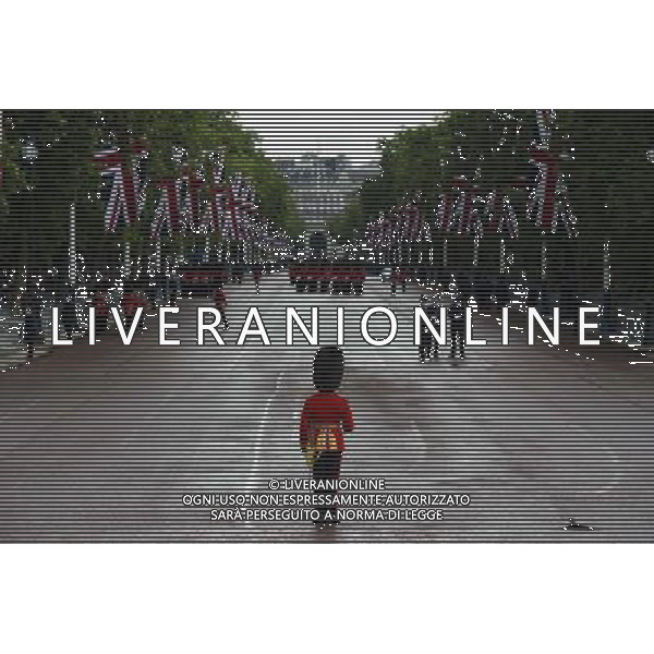 A Guard of Honour marches down the Mall on June 4, 2014 in London, England. Queen Elizabeth II is to unveil government\'s legislative programme in a speech delivered to Members of Parliament and Peers in The House of Lords during the annual state opening of the British parliament. AG ALDO LIVERANI SAS ONLY ITALY