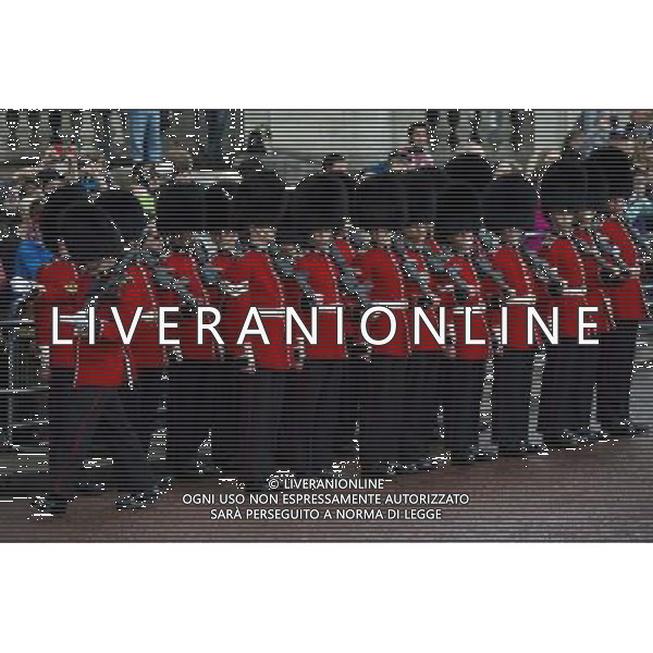 A Guard of Honour marches down the Mall on June 4, 2014 in London, England. Queen Elizabeth II is to unveil government\'s legislative programme in a speech delivered to Members of Parliament and Peers in The House of Lords during the annual state opening of the British parliament. AG ALDO LIVERANI SAS ONLY ITALY