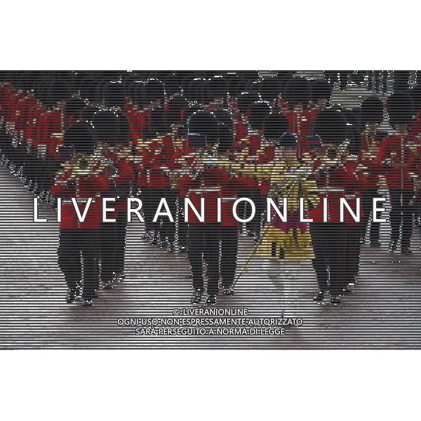 A Guard of Honour marches past Buckingham Palace and down the Mall on June 4, 2014 in London, England. Queen Elizabeth II is to unveil government\'s legislative programme in a speech delivered to Members of Parliament and Peers in The House of Lords during the annual state opening of the British parliament. AG ALDO LIVERANI SAS ONLY ITALY