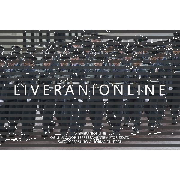 Members of the RAF march past Buckingham Palace and down the Mall on June 4, 2014 in London, England. Queen Elizabeth II is to unveil government\'s legislative programme in a speech delivered to Members of Parliament and Peers in The House of Lords during the annual state opening of the British parliament. AG ALDO LIVERANI SAS ONLY ITALY