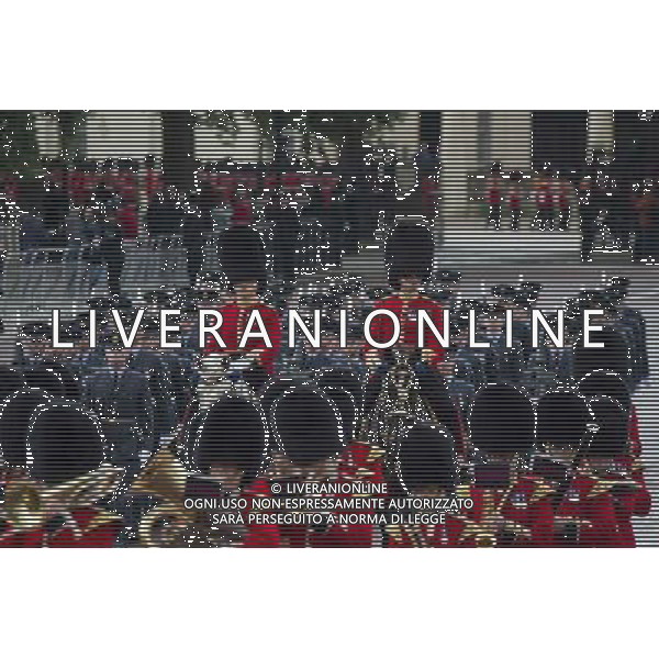 A Guard of Honour marches past Buckingham Palace and down the Mall on June 4, 2014 in London, England. Queen Elizabeth II is to unveil government\'s legislative programme in a speech delivered to Members of Parliament and Peers in The House of Lords during the annual state opening of the British parliament. AG ALDO LIVERANI SAS ONLY ITALY