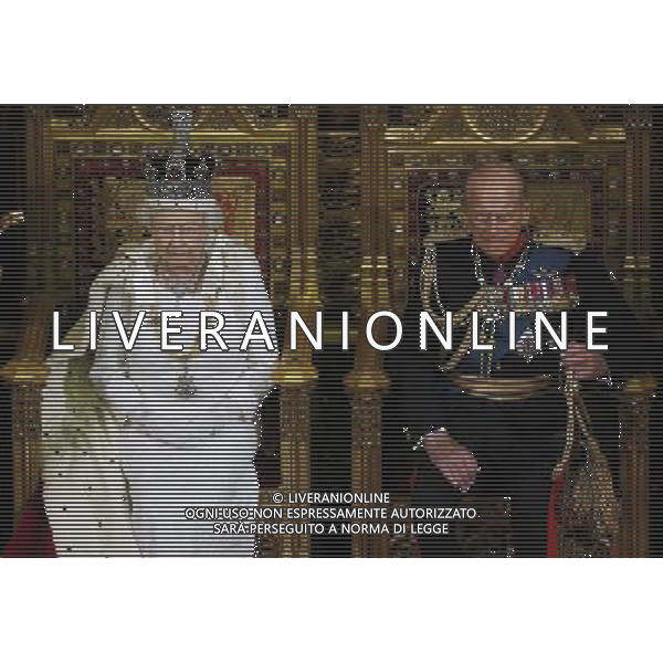 Britain\'s Queen Elizabeth sits with Prince Philip as they wait for members of the Commons to arrive to listen to her speech in the House of Lords, during the State Opening of Parliament at the Palace of Westminster in London June 4, 2014. AG ALDO LIVERANI SAS ONLY ITALY