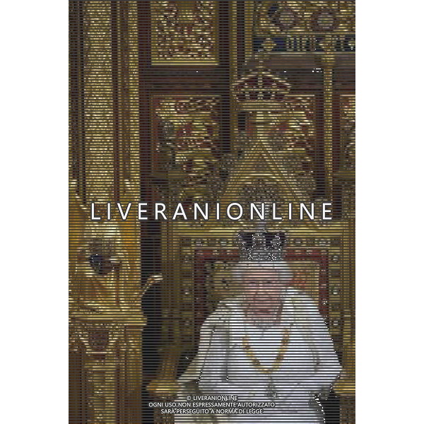 Britain\'s Queen Elizabeth II delivers the Queen\'s Speech from the Throne in the House of Lords during the State Opening of Parliament at the Palace of Westminster in London on June 4, 2014. The State Opening of Parliament marks the formal start of the parliamentary year and the Queen\'s Speech sets out the government\'s agenda for the coming session. AG ALDO LIVERANI SAS ONLY ITALY