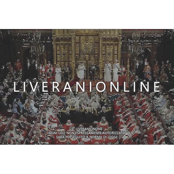 Britain\'s Queen Elizabeth II (CL) delivers the Queen\'s Speech from the Throne in the House of Lords flanked by Prince Philip, Duke of Edinburgh (CR) and Britain\'s Prince Charles, Prince of Wales and Camilla, Duchess of Cornwall (L) during the State Opening of Parliament at the Palace of Westminster in London on June 4, 2014. The State Opening of Parliament marks the formal start of the parliamentary year and the Queen\'s Speech sets out the government\'s agenda for the coming session. AG ALDO LIVERANI SAS ONLY ITALY