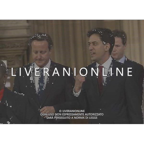  Date: 04/06/14 Pictured: Prime Minster David Cameron and Labour party leader Ed Miliband Caption: Mp\'s walk through the Central Lobby in the houses of Parliament in London today for the State Opening of Parliament which takes place on the first day of a new parliamentary session. The Queen makes a Speech setting out the Government\'s agenda for the year ahead. AG ALDO LIVERANI SAS ONLY ITALY