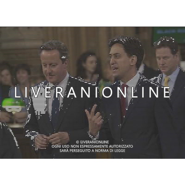  Date: 04/06/14 Pictured: Prime Minster David Cameron and Labour party leader Ed Miliband Caption: Mp\'s walk through the Central Lobby in the houses of Parliament in London today for the State Opening of Parliament which takes place on the first day of a new parliamentary session. The Queen makes a Speech setting out the Government\'s agenda for the year ahead. AG ALDO LIVERANI SAS ONLY ITALY