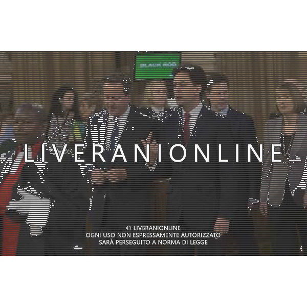  Date: 04/06/14 Pictured: Prime Minster David Cameron and Labour party leader Ed Miliband Caption: Mp\'s walk through the Central Lobby in the houses of Parliament in London today for the State Opening of Parliament which takes place on the first day of a new parliamentary session. The Queen makes a Speech setting out the Government\'s agenda for the year ahead. AG ALDO LIVERANI SAS ONLY ITALY
