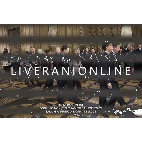  Date: 04/06/14 Pictured: Prime Minster David Cameron and Labour party leader Ed Miliband (far right ) followed by the rest of the MPs Caption: Mp\'s walk through the Central Lobby in the houses of Parliament in London today for the State Opening of Parliament which takes place on the first day of a new parliamentary session. The Queen makes a Speech setting out the Government\'s agenda for the year ahead. AG ALDO LIVERANI SAS ONLY ITALY