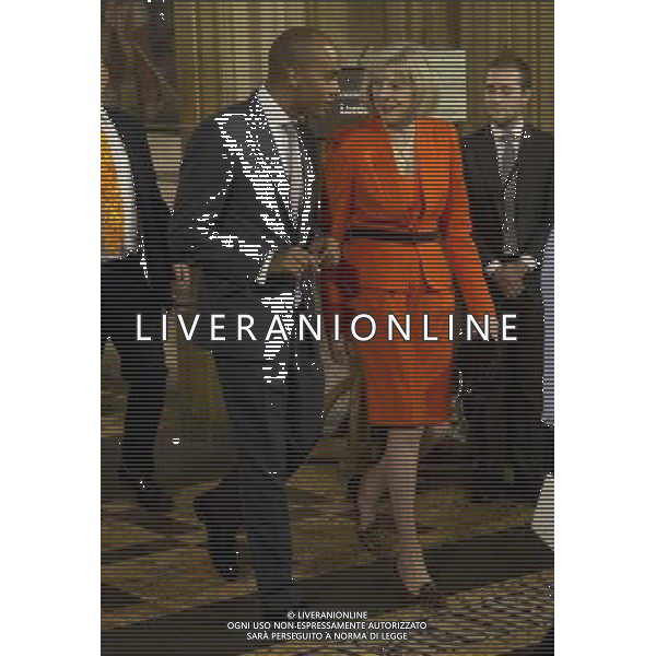  Date: 04/06/14 Pictured: Theresa May and Chuka Umunna Caption: Mp\'s walk through the Central Lobby in the houses of Parliament in London today for the State Opening of Parliament which takes place on the first day of a new parliamentary session. The Queen makes a Speech setting out the Government\'s agenda for the year ahead. AG ALDO LIVERANI SAS ONLY ITALY