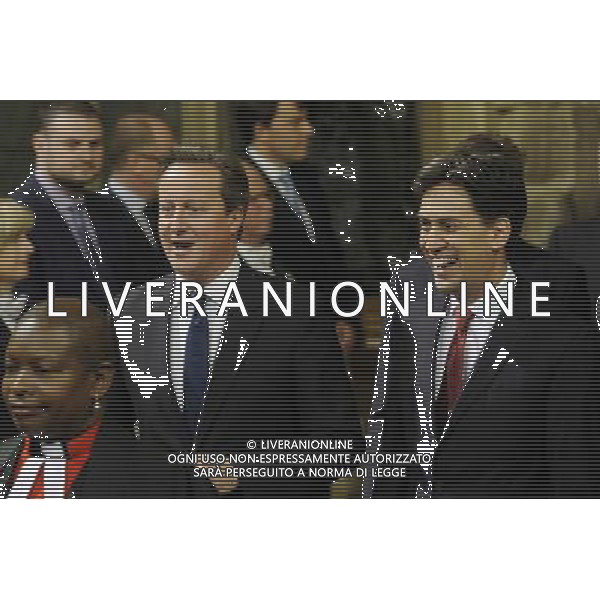 British Prime Minister David Cameron (L) and Leader of the Labour Party and Opposition Ed Miliband (R) walk through the Members Lobby at the State Opening of Parliament, Palace of Westminster, London, UK. 04/06/2014. AG ALDO LIVERANI SAS ONLY ITALY