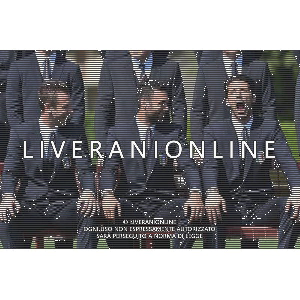 (140604) -- FLORENCE, June 4, 2014 () -- Italy\'s national soccer team players Antonio Cassano, Salvatore Sirigu and Gianluigi Buffon (From L to R) react as they prepare to pose for an official photo in Coverciano, near Florence, Italy, June 3, 2014, prior to their departure for the World Cup 2014. ©photoshot/Agenzia Aldo Liverani sas - ITALY ONLY - EDITORIAL USE ONLY