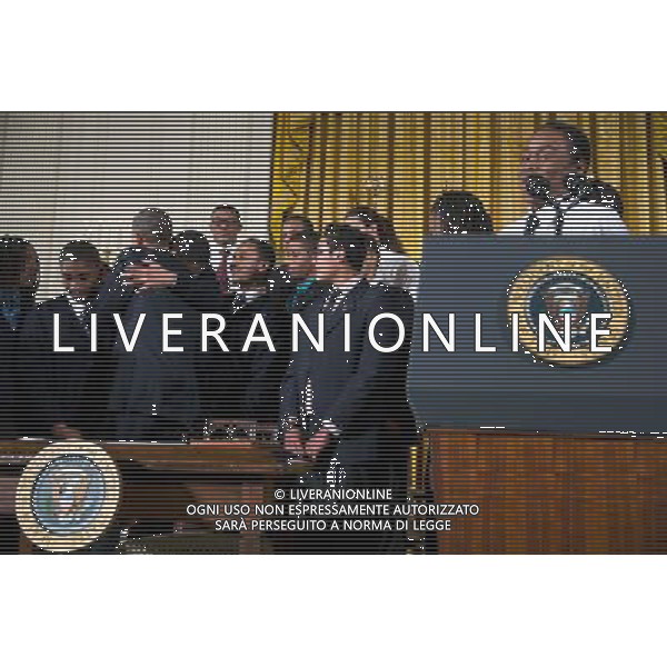 President Barack Obama hugs a participant after signing a Presidential Memorandum establishing the My Brother\'s Keeper Task Force, during an event to highlight \'My Brother\'s Keeper,\' an initiative to expand opportunity for young men and boys of color, in the East Room of the White House, Feb. 27, 2014. ©photoshot/Agenzia Aldo Liverani sas - ITALY ONLY - Il Presidente americano Barack Obama