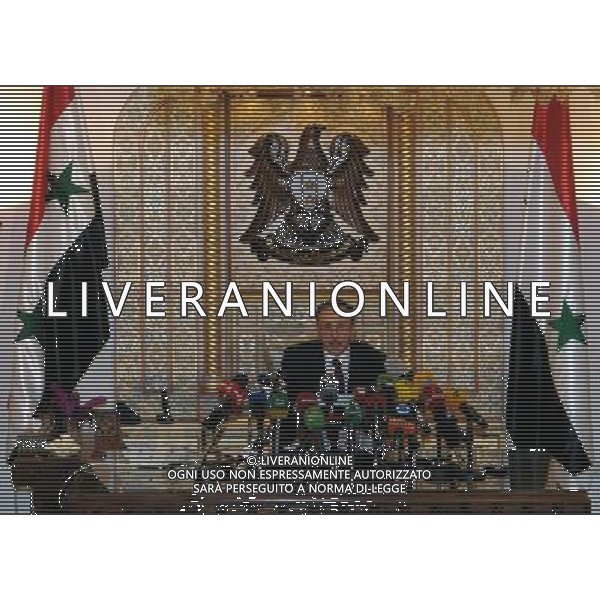 (140604) -- DAMASCUS, June 4, 2014 () -- Mohammad Jihad al-Laham, Syrian parliament\'s speaker, announces the result of presidential elections in Damascus, Syria on June 4, 2014. Syria\'s incumbent President Bashar al-Assad has won a third seven-year term in office in the presidential elections that took place on Tuesday, the Syrian Parliament announced on Wednesday. (/Zhang Naijie) ©photoshot/Agenzia Aldo Liverani sas - ITALY ONLY - EDITORIAL USE ONLY - Conferenza Stampa per l\'annuncio dei risultati delle elezioni presidenziali a Damasco, in Siria il 4 giugno 2014.
