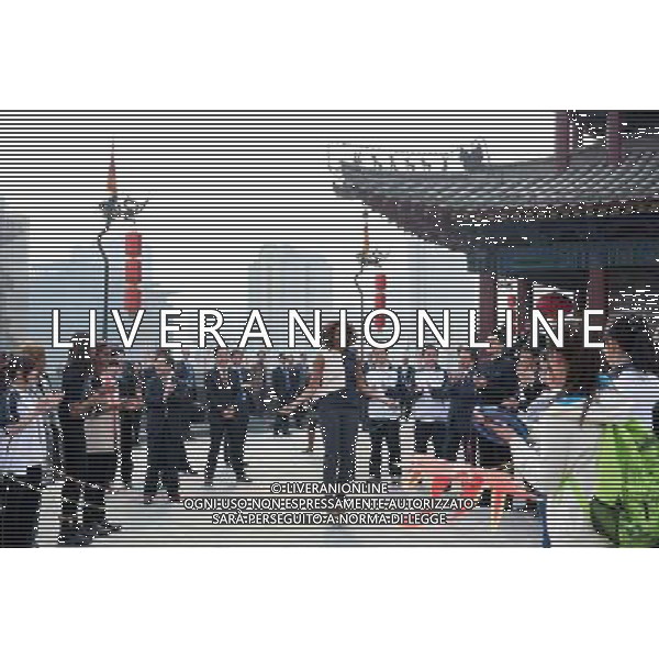 First Lady Michelle Obama, accompanied by daughters Sasha and Malia, and Marian Robinson, jumps rope as children demonstrate games during a visit to the City Wall in Xi\'an, China, March 24, 2014. ©PHOTOSHOT/Agenzia Aldo Liverani sas - ITALY ONLY - EDITORIAL USE ONLY - Il Presidente americano Barack Obama