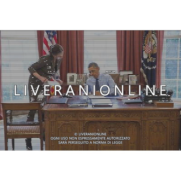 President Barack Obama, with Staff Secretary Joani Walsh, signs bills in the Oval Office, March 21, 2014. ©PHOTOSHOT/Agenzia Aldo Liverani sas - ITALY ONLY - EDITORIAL USE ONLY - Il Presidente americano Barack Obama