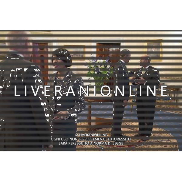 President Barack Obama greets Philadelphia Mayor Michael Nutter while Vice President Joe Biden talks with Baltimore Mayor Stephanie Rawlings-Blake during a reception for the U.S. Conference of Mayors in the Blue Room of the White House, Jan. 23, 2014. ©PHOTOSHOT/Agenzia Aldo Liverani sas - ITALY ONLY - EDITORIAL USE ONLY - Il Presidente americano Barack Obama
