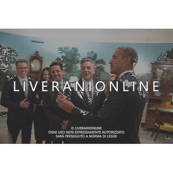 President Barack Obama jokes with cast members of the movie \'The Monuments Men\' in the Diplomatic Reception Room, prior to a movie screening in the Family Theater of the White House, Feb. 18, 2014. Standing from left are: Matt Damon and his wife Luciana Damon, Grant Heslov, and George Clooney. ©PHOTOSHOT/Agenzia Aldo Liverani sas - ITALY ONLY - EDITORIAL USE ONLY - Il Presidente americano Barack Obama