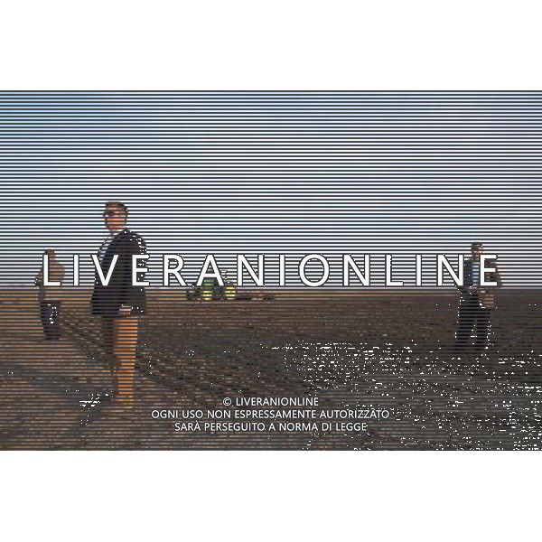 Secret Service agents stand by as President Barack Obama delivers a statement about the severe drought in California, after touring the farm of Joe and Maria Del Bosque in Los Banos, Calif., Feb. 14, 2014. ©PHOTOSHOT/Agenzia Aldo Liverani sas - ITALY ONLY - EDITORIAL USE ONLY - Il Presidente americano Barack Obama