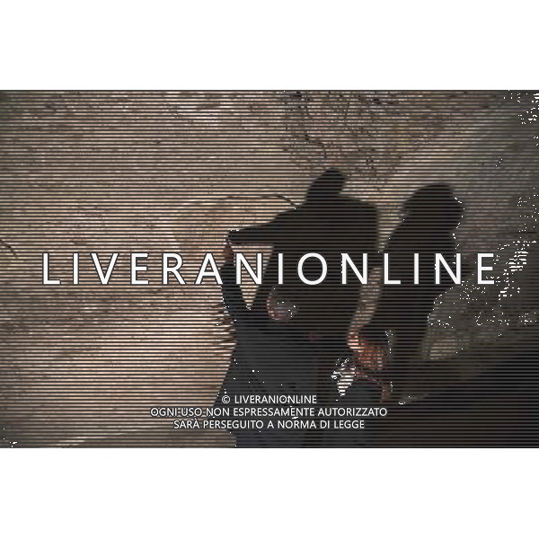 President Barack Obama points to writing on a wall during a tour of the Colosseum with Barbara Nazzaro, Technical Director \' Architect of the Colosseum, in Rome, Italy, March 27, 2014. ©PHOTOSHOT/Agenzia Aldo Liverani sas - ITALY ONLY - EDITORIAL USE ONLY - Il Presidente americano Barack Obama