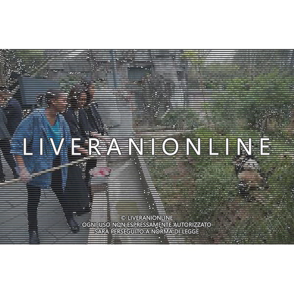 First Lady Michelle Obama, daughters Sasha and Malia, and Marian Robinson feed apples to giant pandas during their visit to the Giant Panda Research Base in Chengdu, China, March 26, 2014. ©PHOTOSHOT/Agenzia Aldo Liverani sas - ITALY ONLY - EDITORIAL USE ONLY - Il Presidente americano Barack Obama
