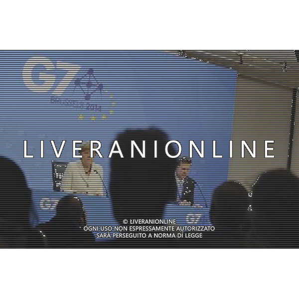 (140605) -- BRUSSELS, June 5, 2014 () -- Germany\'s Chancellor Angela Merkel (L) speaks at a press briefing after the G7 Summit, at the EU Council headquarters in Brussels of Belgium, June 5, 2014.(/Ye Pingfan) ©PHOTOSHOT/Agenzia Aldo Liverani sas - ITALY ONLY - EDITORIAL USE ONLY - Vertice del G7 a Bruxelles, in Belgio, 5 Giugno 2014