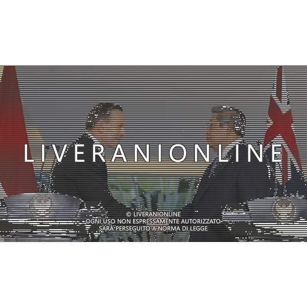 (140604) -- BATAM, June 4, 2014 () -- Australian Prime Minister Tony Abbott (L) shakes hands with Indonesian President Susilo Bambang Yudhoyono during their bilateral meeting in Batam, Indonesia, June 4, 2014. The leaders of Indonesia and Australia met Wednesday for the first time since relations between the countries were damaged over spying allegations. (/HO/Abror Rizki) ©photoshot/Agenzia Aldo Liverani sas - ITALY ONLY - EDITORIAL USE ONLY - Il primo ministro australiano Tony Abbott incontra il presidente indonesiano Susilo Bambang Yudhoyono durante il loro incontro bilaterale a Batam, Indonesia, 4 giugno, 2014