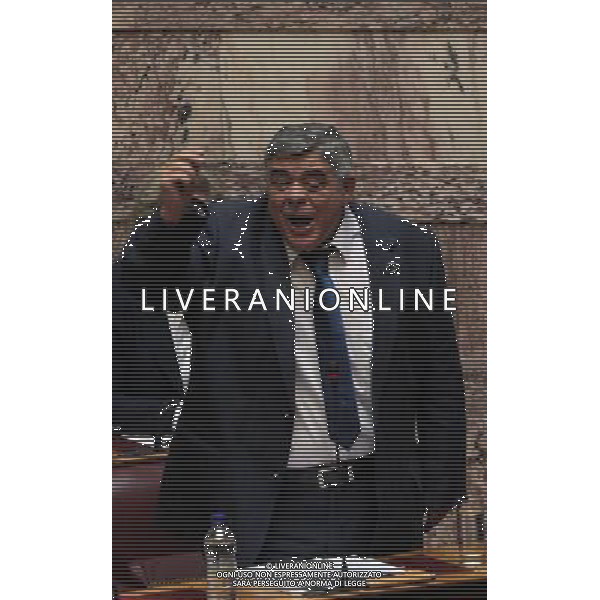 (140604) -- ATHENS, Jun. 04, 2014 () - The leader of the far-right political party Golden Dawn Nikos Michaloliakos speaks to parliament members in Athens on June 4, 2014. Michaloliakos, together with Christos Pappas and Yannis Lagos, two deputies of the party, were transferred from prison to parliament to speak during a debate on lifting their immunity on new charges concerning weapon carrying. (/Marios Lolos)(bxq) ©photoshot/Agenzia Aldo Liverani sas - ITALY ONLY - EDITORIAL USE ONLY ©PHOTOSHOT/Agenzia Aldo Liverani Sas - ITALY ONLY - EDITORIAL USE ONLY