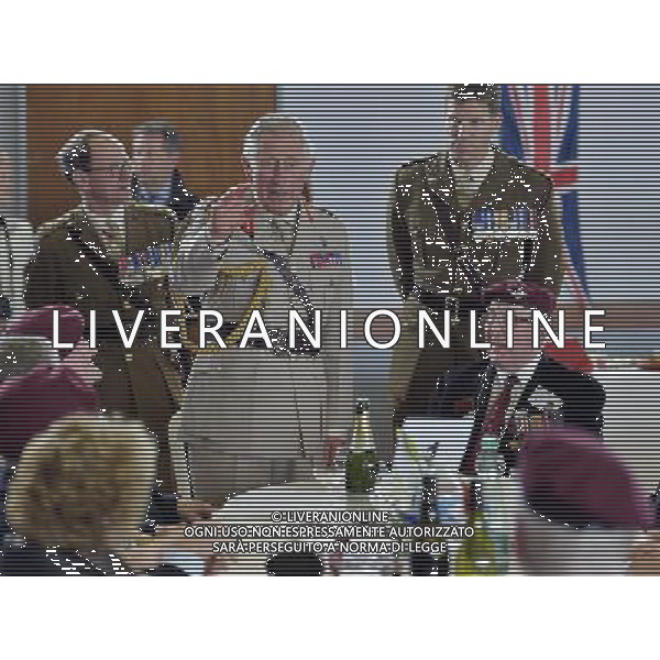 Pic Bruce Adams / Copy Rota - 05/06/14 D-Day 70th Anniversary commemorations. - **ROYAL ROTA** - HRH Prince Charles and the Duchess Of Cornwall attend a lunch with D-day veterans at a community centre in Ranville, Normandy, France. - REALI INGLESI - il Principe Carlo d\'inghilterra con la moglie Camilla duchessa di Cornovaglia partecipare ad un pranzo con i veterani del 70mo Anniversario del D-day in un centro sociale in Ranville, Normandia, Francia