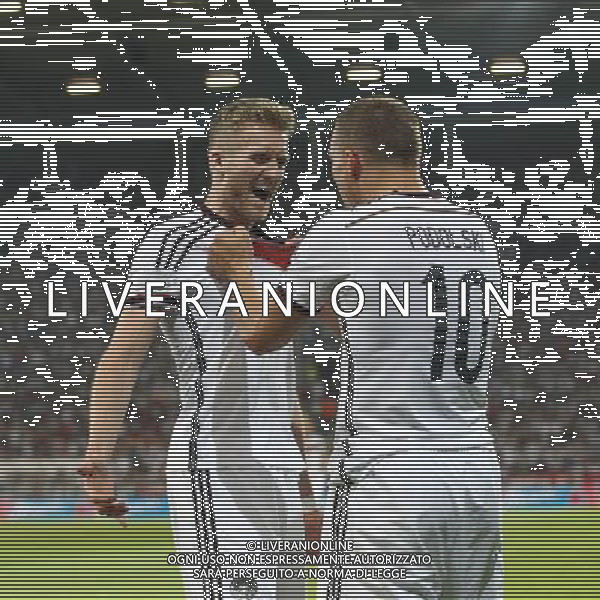 06.06.2014, Coface Arena, Mainz, GER, FIFA WM, Testspiel, Deutschland vs Armenien, im Bild Andre Schuerrle (Deutschland) bejubelt seinen Treffer zum 1:0 mit Lukas Podolski (Deutschland) // during friendly match between Germany and Armenia for Preparation of the FIFA Worldcup Brasil 2014 at the Coface Arena in Mainz, Germany on 2014/06/06. EXPA Pictures © 2014, PhotoCredit: EXPA/ Eibner-Pressefoto/ Neis *****ATTENTION - OUT of GER***** ©photoshot/Agenzia Aldo Liverani sas - ITALY ONLY - Germania vs Armenia partita amichevole in preparazione della Coppa del Mondo FIFA Brasile 2014 Coface Arena di Magonza, in Germania 06 giugno 2014