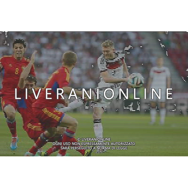 06.06.2014, Coface Arena, Mainz, GER, FIFA WM, Testspiel, Deutschland vs Armenien, im Bild Andre Schuerrle (Deutschland) zieht ab, wird aber von Varazdat Haroyan (Armenien) und Hrayr Mkoyan (Armenien) geblockt. // during friendly match between Germany and Armenia for Preparation of the FIFA Worldcup Brasil 2014 at the Coface Arena in Mainz, Germany on 2014/06/06. EXPA Pictures © 2014, PhotoCredit: EXPA/ Eibner-Pressefoto/ EIBNER *****ATTENTION - OUT of GER***** ©photoshot/Agenzia Aldo Liverani sas - ITALY ONLY - Germania vs Armenia partita amichevole in preparazione della Coppa del Mondo FIFA Brasile 2014 Coface Arena di Magonza, in Germania 06 giugno 2014