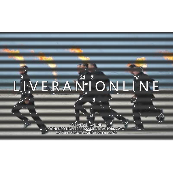 (140606) -- NORMANDY, June 6, 2014 () -- Dancers perform during a ceremony marking 70th anniversary of D-Day landings, in Sword beach in Ouistreham, Normandy, northern France on June 6, 2014.(/Chen Xiaowei) ©photoshot/Agenzia Aldo Liverani sas - ITALY ONLY - Celebrazioni del 70mo anniversario degli sbarchi del D-Day, in spiaggia Sword in Ouistreham, Normandia, nel nord della Francia il 6 giugno 2014.