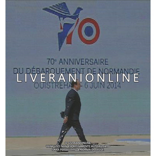 (140606) -- NORMANDY, June 6, 2014 () -- French President Francois Hollande attends a ceremony marking 70th anniversary of D-Day landings, in Sword beach in Ouistreham, Normandy, northern France on June 6, 2014.(/Chen Xiaowei) ©photoshot/Agenzia Aldo Liverani sas - ITALY ONLY - Celebrazioni del 70mo anniversario degli sbarchi del D-Day, in spiaggia Sword in Ouistreham, Normandia, nel nord della Francia il 6 giugno 2014.