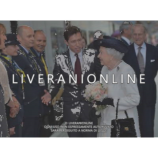 LONDON, ENGLAND - JUNE 05: Nicolas Petrovic, CEO Eurostar introduces Queen Elizabeth II to members of staff before boarding the Eurostar train during a ceremony to mark the 20th Anniversary of the opening of the Eurotunnel as she departs for a State visit to France at St Pancras Station on June 5, 2014 in London, England. (Photo by Anthony Harvey - WPA Pool /Getty Images) ©photoshot/Agenzia Aldo Liverani sas - ITALY ONLY - REALI INGLESI: La Regina Elisabetta II d\'Inghilterra al 20mo° anniversario dell\'apertura dell\'Eurotunnel durante la sua visita di Stato in Francia alla stazione di St Pancras il 5 giugno 2014 a Londra, Inghilterra