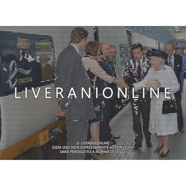 LONDON, ENGLAND - JUNE 05: Nicolas Petrovic, CEO Eurostar introduces Queen Elizabeth II to members of staff before boarding the Eurostar train during a ceremony to mark the 20th Anniversary of the opening of the Eurotunnel as she departs for a State visit to France at St Pancras Station on June 5, 2014 in London, England. (Photo by Anthony Harvey - WPA Pool /Getty Images) ©photoshot/Agenzia Aldo Liverani sas - ITALY ONLY - REALI INGLESI: La Regina Elisabetta II d\'Inghilterra al 20mo° anniversario dell\'apertura dell\'Eurotunnel durante la sua visita di Stato in Francia alla stazione di St Pancras il 5 giugno 2014 a Londra, Inghilterra