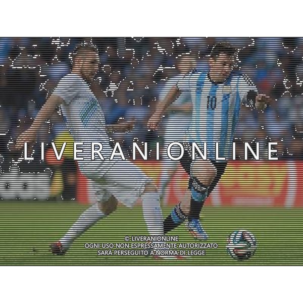 (140608) -- LA PLATA, June 8, 2014 () -- Argentina\'s Lionel Messi (R) vies for the ball with Branko Ilic of Slovenia during the friendly match prior to the FIFA World Cup at Ciudad de La Plata Stadium, in La Plata, Argentina, on June 7, 2014. (/Victor Carreira/TELAM) (vf) (fnc) ©PHOTOSHOT/Agenzia Aldo Liverani sas - ITALY ONLY - EDITORIAL USE ONLY - ARGENTINA vs SLOVENIA partita amichevole prima Coppa del Mondo FIFA a Ciudad de la Plata Stadium, a La Plata, in Argentina, il 7 giugno 2014