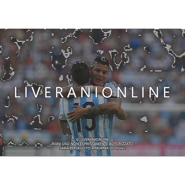 (140608) -- LA PLATA, June 8, 2014 () -- Argentina\'s Ricardo Alvarez (front) celebrates after scoring with his teammate Marcos Rojo during the friendly match against Slovenia prior to the FIFA World Cup at Ciudad de La Plata Stadium, in La Plata, Argentina, on June 7, 2014. (/Victor Carreira/TELAM) (vf) (fnc) ©PHOTOSHOT/Agenzia Aldo Liverani sas - ITALY ONLY - EDITORIAL USE ONLY - ARGENTINA vs SLOVENIA partita amichevole prima Coppa del Mondo FIFA a Ciudad de la Plata Stadium, a La Plata, in Argentina, il 7 giugno 2014