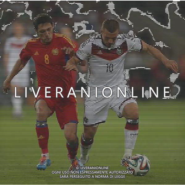 Benefizspiel, Deutschland vs. Armenien, 06.06.14 Lukas Podolski (Deutschland), Hovsepyan (Armenien) International Friendly match between Germany and Armenia at Coface Arena on June 6, 2014 in Mainz, Germany. ©PHOTOSHOT/Agenzia Aldo Liverani sas - ITALY ONLY - EDITORIAL USE ONLY - Germania vs Armenia partita amichevole in preparazione della Coppa del Mondo FIFA Brasile 2014 Coface Arena di Magonza, in Germania 06 giugno 2014
