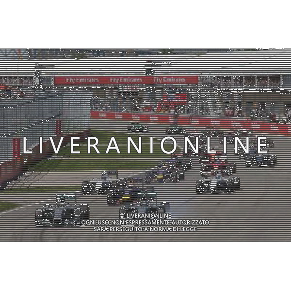 Nico Rosberg (GER) Mercedes AMG F1 W05 (Right) locks up under braking at the start of the race next to team mate Lewis Hamilton (GBR) Mercedes AMG F1 W05. 08.06.2014. Formula 1 World Championship, Rd 7, Canadian Grand Prix, Montreal, Canada, Race Day. - www.xpbimages.com, EMail: requests@xpbimages.com - copy of publication required for printed pictures. Every used picture is fee-liable. © Copyright: Moy / XPB Images AG ALDO LIVERANI SAS ONLY ITALY