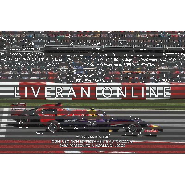 Daniel Ricciardo (AUS) Red Bull Racing RB10 and Fernando Alonso (ESP) Ferrari F14-T at the start of the race. 08.06.2014. Formula 1 World Championship, Rd 7, Canadian Grand Prix, Montreal, Canada, Race Day. - www.xpbimages.com, EMail: requests@xpbimages.com - copy of publication required for printed pictures. Every used picture is fee-liable. © Copyright: Moy / XPB Images AG ALDO LIVERANI SAS ONLY ITALY