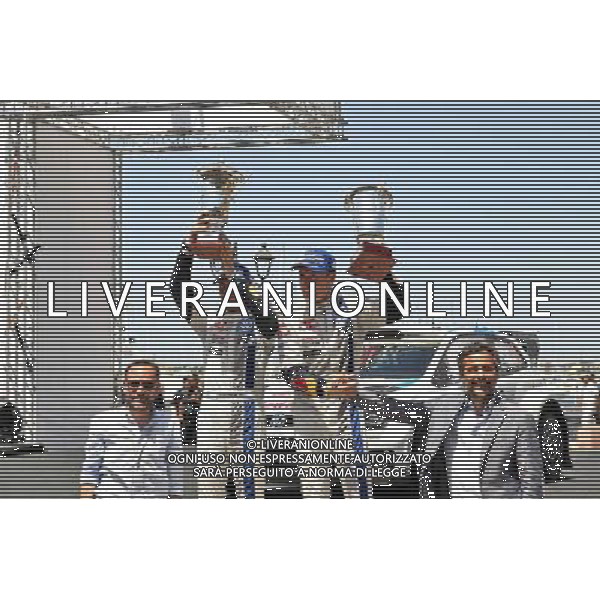 08.06.2014, Alghero, ITA, FIA, WRC, Rally Italia Sardegna, Tag 3, im Bild Jari-Matti Latvala/Miikka Anttila (Volkswagen Motorsport/Polo R WRC) on the Podium with Trophys // during the FIA Rally Italia Sardegna at the in Alghero, Italy on 2014/06/08. EXPA Pictures © 2014, PhotoCredit: EXPA/ Eibner-Pressefoto/ Bermel *****ATTENTION - OUT of GER***** AG ALDO LIVERANI SAS ONLY ITALY