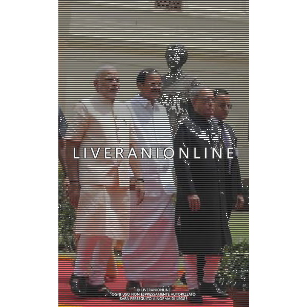(140609) -- NEW DELHI, June 9, 2014 () -- Indian President Pranab Mukherjee (3rd L), Indian Prime Minister Narendra Modi (1st L) and Parliamentary Affairs Minister M. Venkaiah Naidu (2nd L) proceed towards Central Hall of the parliament in a procession where President addresses the joint session of Parliament in New Delhi, India, June 9, 2014. () ©PHOTOSHOT/Agenzia Aldo Liverani sas - ITALY ONLY - EDITORIAL USE ONLY - Campagna elettorale dei candidati alle elezioni presidenziali a Jakarta, in Indonesia, 9 giugno 2014