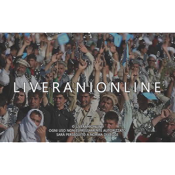 (140610) -- Kabul, June 10,2014.() -- Supporters shout slogans during an election campaign on the outskirts of Kabul, Afghanistan on June 9, 2014. (/Ahmad Massoud) ©PHOTOSHOT/Agenzia Aldo Liverani sas - ITALY ONLY - EDITORIAL USE ONLY - Campagna elettorale per le elezioni presidenziali alla periferia di Kabul, in Afghanistan il 9 giugno 2014